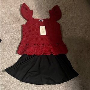 Universal Thread Red Crochet Top with a black skirt that has shorts underneath
